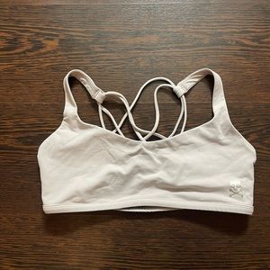 Light pink lululemon energy bra size 10